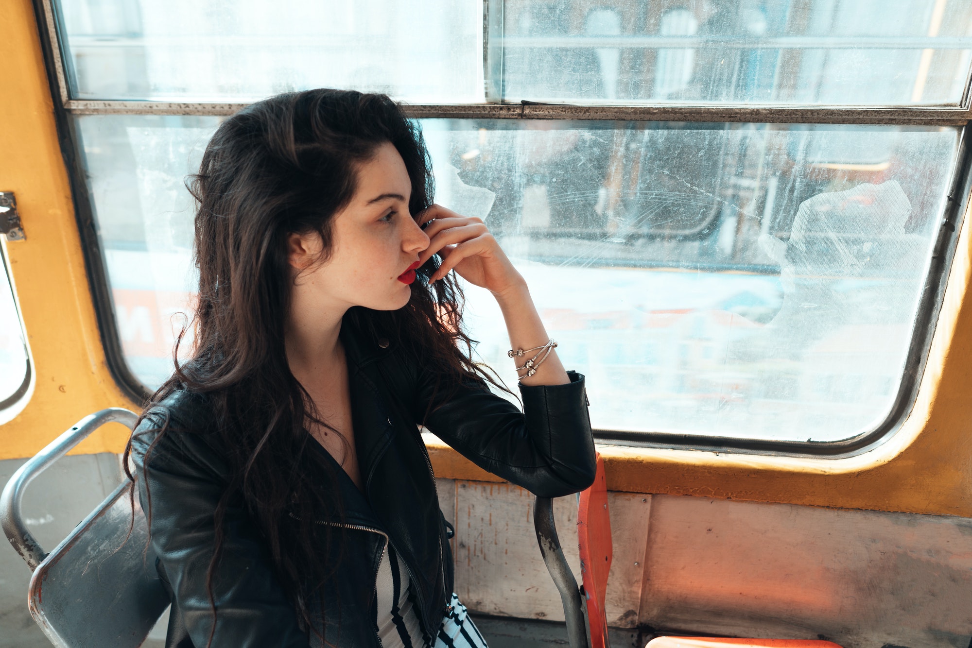 Woman traveling inside the tram